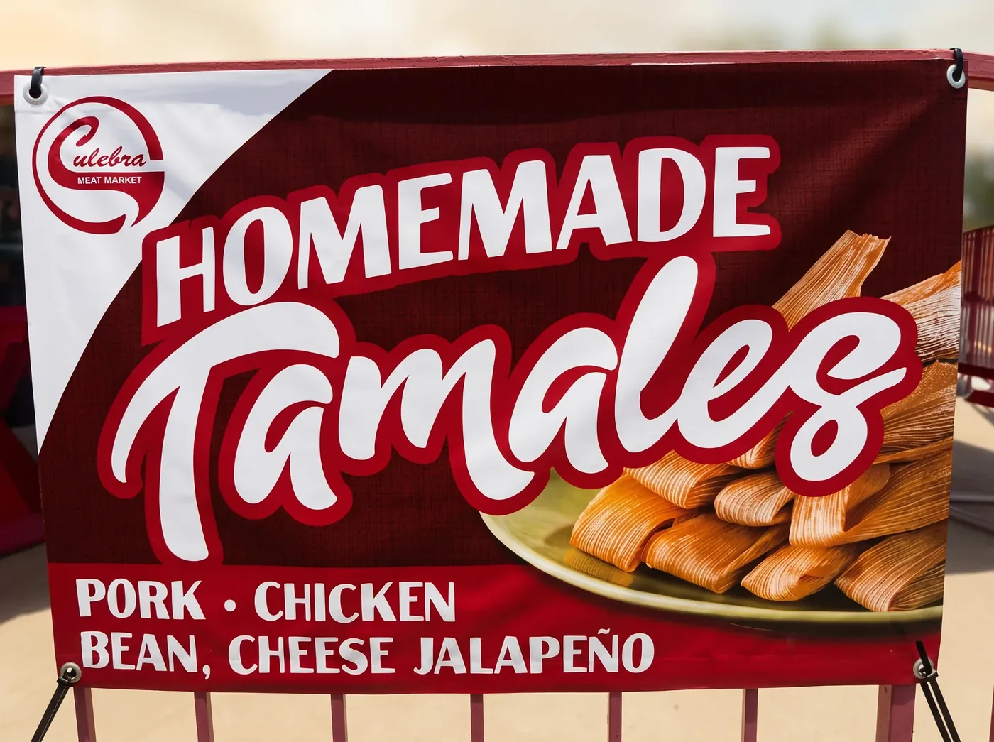 Culebra Café banner advertising homemade pork, chicken, bean and cheese tamales